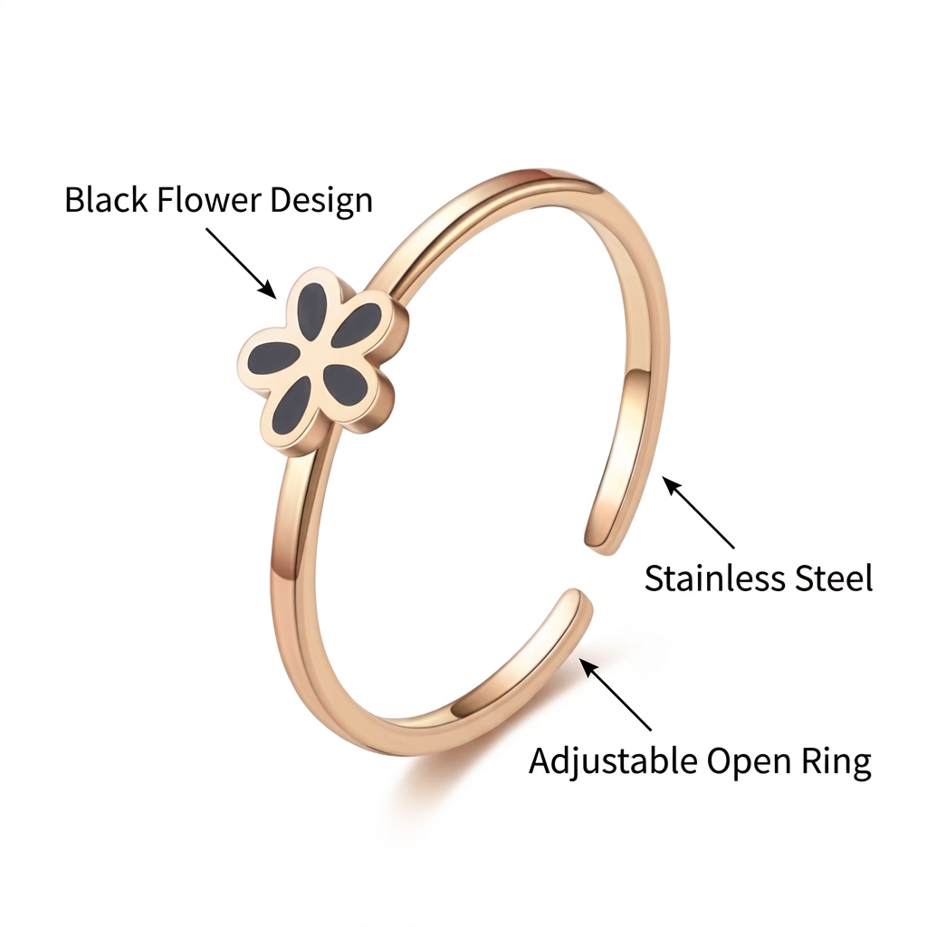 Złoty pierścionek z czarnym kwiatkiem, angielska specyfikacja na białym tle